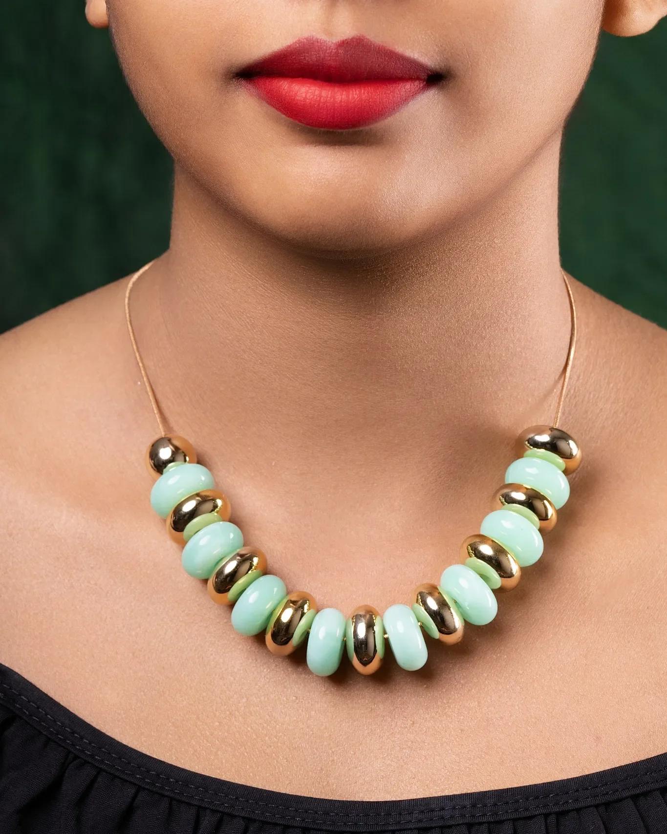 sage-green-and-gilded-disc-statement-necklace
