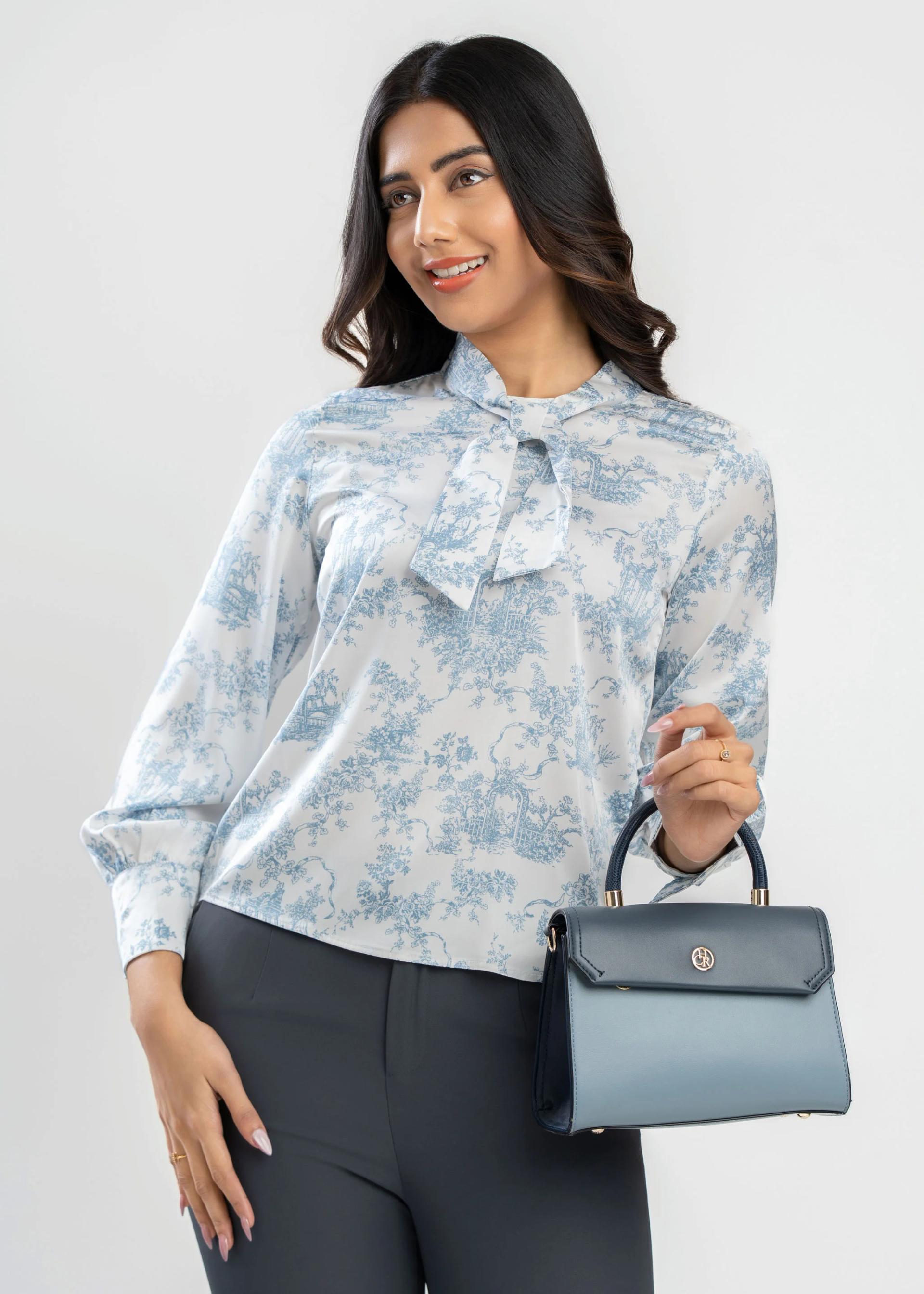 blue-and-white-scenery-print-tie-neck-blouse