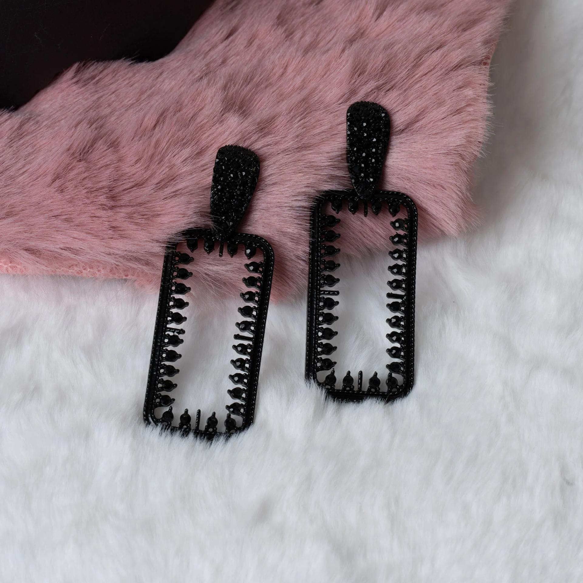 black-studded-open-rectangle-dangle-earrings