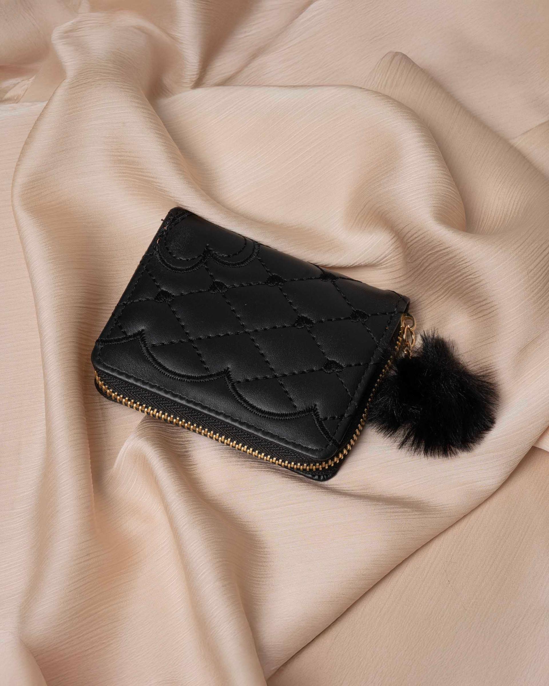 ladies-pompom-black-pouch