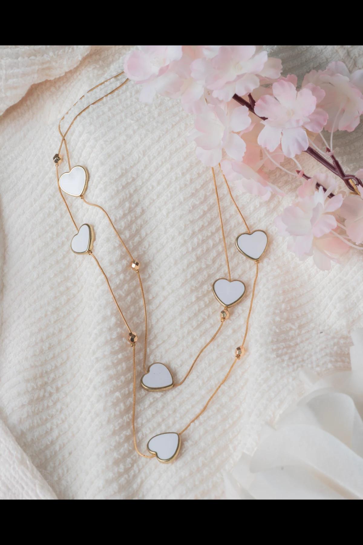layered-goldtoned-necklace-with-white-heart-pendants
